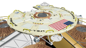 View of a circular disk on top of the lander, with markings, including the US flag 