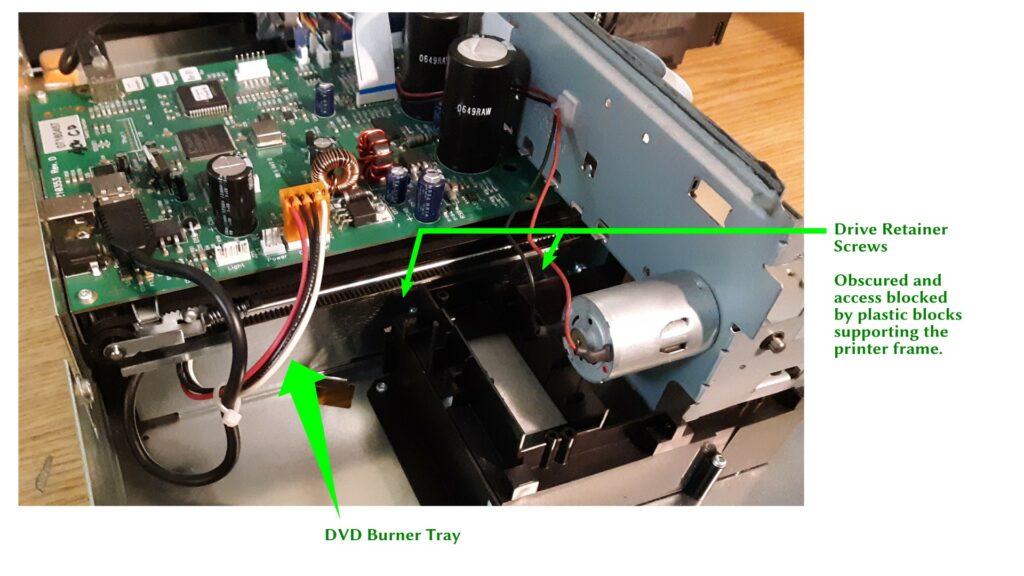 Photo from side, showing the location of the DVD and the obscured location of the screws that hold it in.