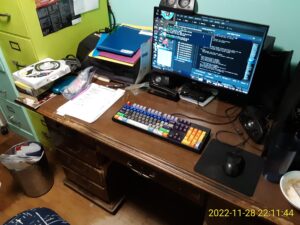 Workstation desk. Relatively uncluttered, though I have file folders out.