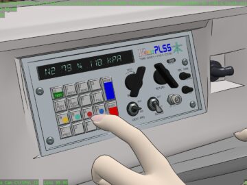 Hand in front of control panel.