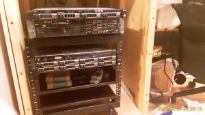 Servers in a newly-built server rack, tucked into the server closet.