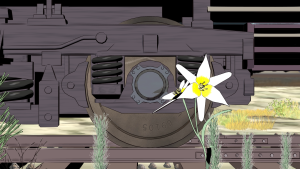 Train wheel with flower in front.