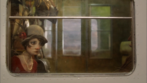 Still from Madame Tutle-Putlie, of the character looking out the train window.